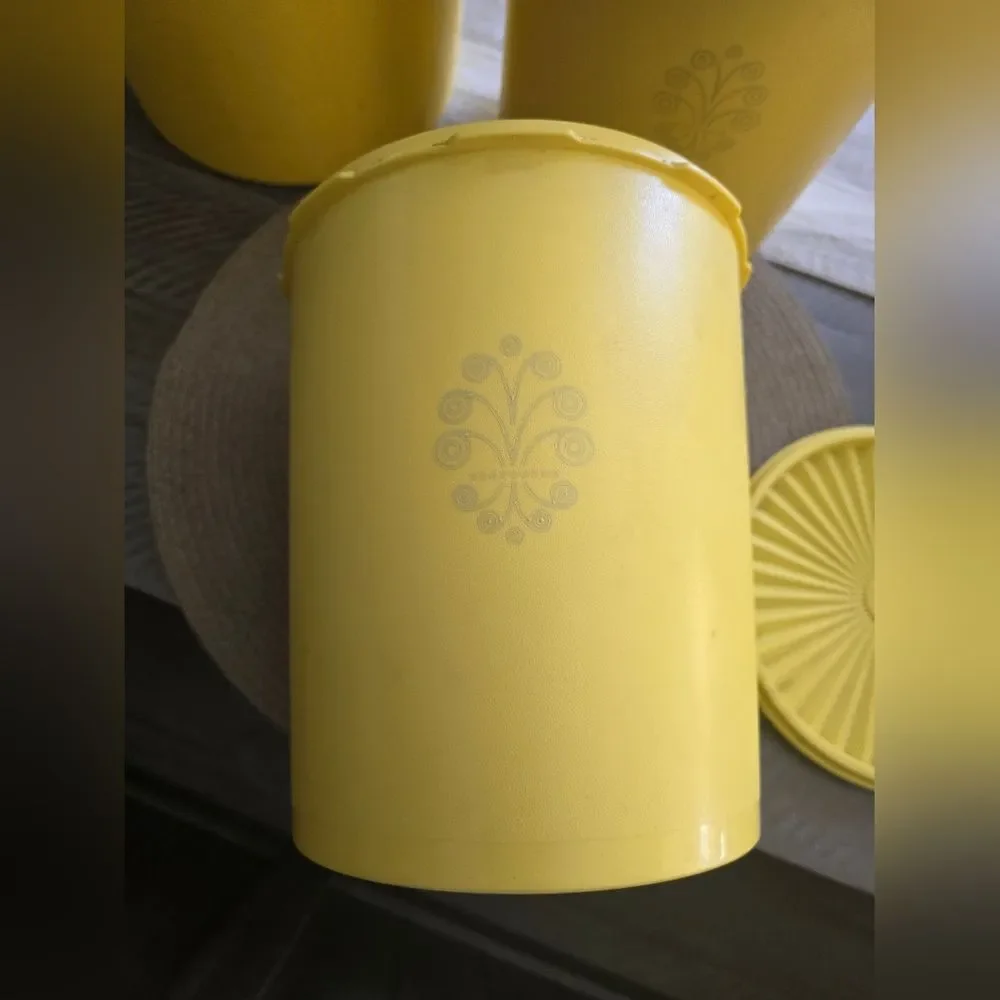 Vintage Tupperware yellow sunburst  canister set of 3.